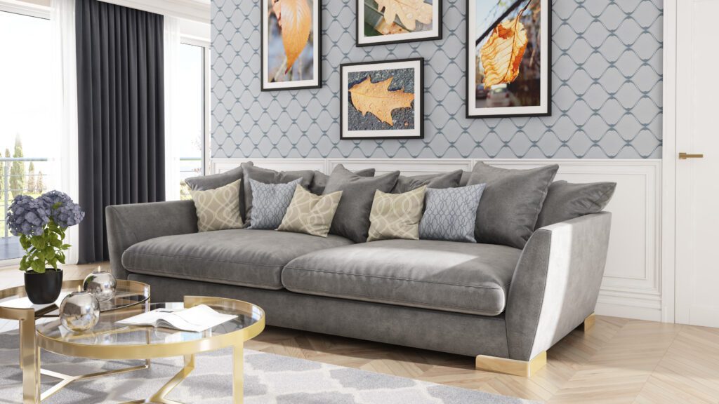 Szara sofa w salonie obita tkaniną w kolorze szarym. Kolekcja Bali.